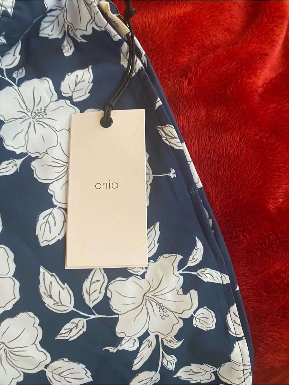Onia Navy Swim Trunks with White Floral Print. Size XXL